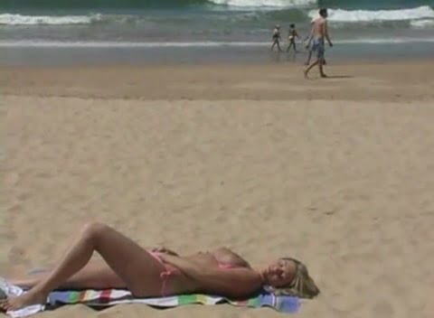 Alison Angel masturbating on the seashore